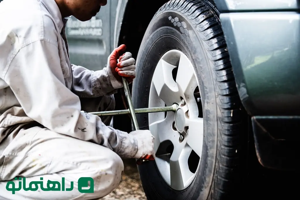 car-repairman-wearing-white-uniform-standing-holding-wrench-that-is-essential-tool-mechanic