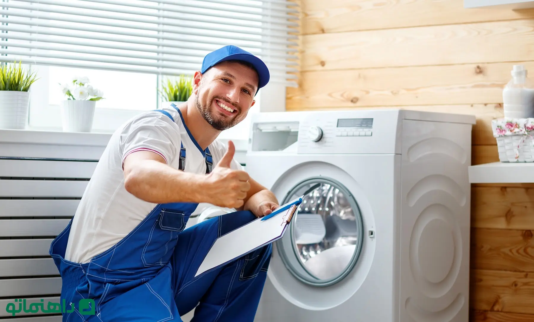 working-man-plumber-repairs-a-washing-machine-in-laundry