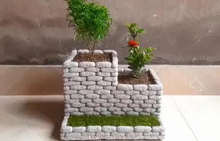 مراحل ساخت یک گلدان زیبا با سیمان و سنگ ریزه + ویدئو