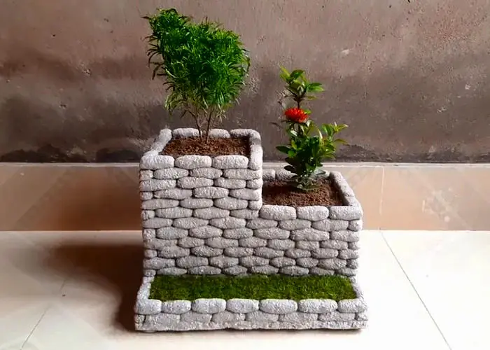مراحل ساخت یک گلدان زیبا با سیمان و سنگ ریزه + ویدئو