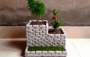 مراحل ساخت یک گلدان زیبا با سیمان و سنگ ریزه + ویدئو
