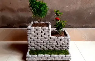 مراحل ساخت یک گلدان زیبا با سیمان و سنگ ریزه + ویدئو