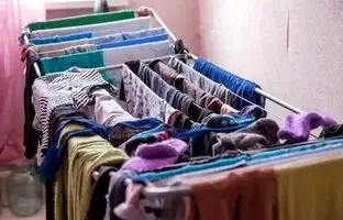 چرا خشک‌کردن لباس‌ها در فضای بسته می‌تواند سلامت شما را به خطر بیندازد؟