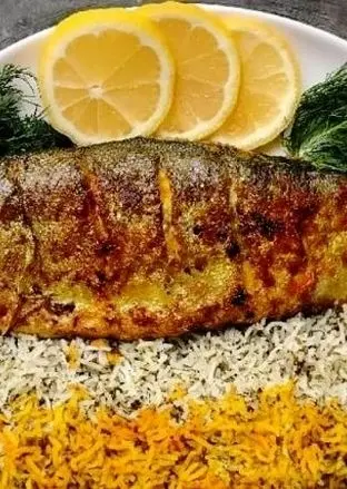 خوشمزه بپزید؛ طرز تهیه سبزی پلو با ماهی شب عید