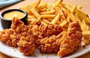 خوشمزه بپزید؛ طرز تهیه مرغ سوخاری رستورانی با سس و سیب زمینی سرخ کرده مخصوص