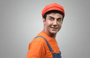 عمو پورنگ در کنار پوری بنایی
