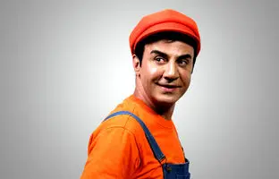 عمو پورنگ در کنار پوری بنایی
