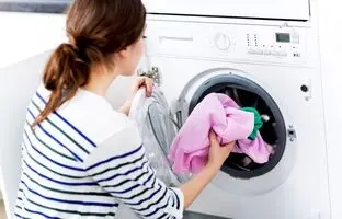 چرا بدنه ماشین لباسشویی برق داره؟