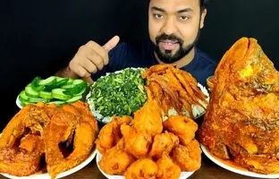 (ویدئو) خوردن هیجان انگیز 2.5 کیلوگرم کله ماهی و چلو ماهی توسط چهره مشهور بنگلادشی