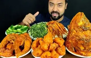 (ویدئو) خوردن هیجان انگیز 2.5 کیلوگرم کله ماهی و چلو ماهی توسط چهره مشهور بنگلادشی