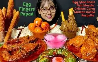 (ویدئو) خوردن متفاوت 5 کیلوگرم چلو ماهی، گوشت و مرغ به سبک دختر مشهور هندی