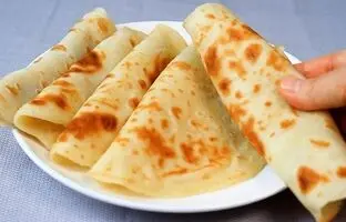 (ویدئو) ساده ترین و سریع ترین روش پخت نان بدون نیاز به فر و مایه خمیر