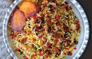 گردوپلو با مرغ جشنواره‌ای از عطر و طعم! حتما امتحانش کن!