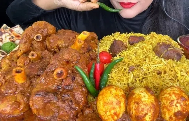 (ویدئو) غذا خوردن با صدا؛ خوردن 4 کیلوگرم چلو گوشت و تخم مرغ توسط دختر مشهور هندی