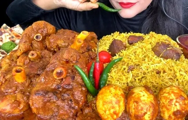 (ویدئو) غذا خوردن با صدا؛ خوردن 4 کیلوگرم چلو گوشت و تخم مرغ توسط دختر مشهور هندی