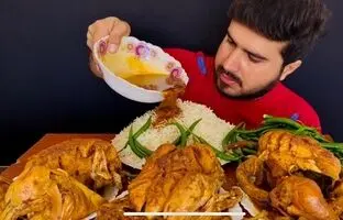 (ویدئو) خوردن تماشایی 6 کیلوگرم چلو مرغ به سبک جوان مشهور پاکستانی