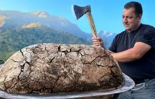 (ویدئو) غذای روستای در آذربایجان؛ کباب کردن بره 14 کیلوگرمی زیر یک لایه خاک رس