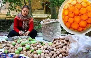 (ویدئو) پخت هیجان انگیز گردو پلو به سبک بانوی روستایی ایرانی