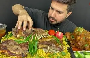 (ویدئو) خوردن 3 کیلوگرم چلو دنده گوسفند و مرغ 2 کیلوگرمی توسط جوان مشهور پاکستانی