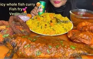 (ویدئو) خوردن 3 کیلوگرم چلو گوشت، ماهی، تخم مرغ و مرغ توسط دختر مشهور هندی