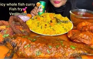 (ویدئو) خوردن 3 کیلوگرم چلو گوشت، ماهی، تخم مرغ و مرغ توسط دختر مشهور هندی