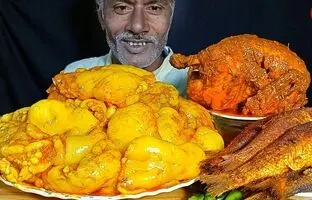 (ویدئو) خوردن دیدنی 4 کیلوگرم چلو چربی، مرغ و ماهی توسط مرد مشهور بنگلادشی