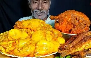 (ویدئو) خوردن دیدنی 4 کیلوگرم چلو چربی، مرغ و ماهی توسط مرد مشهور بنگلادشی