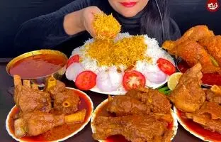 (ویدئو) خوردن 2.25 کیلوگرم چلو گوشت، مرغ و تخم مرغ توسط دختر مشهور هندی