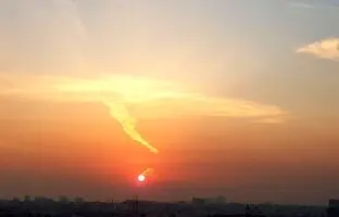 (تصویر) طلوع دیدنی آفتاب در آسمان آلوده تهران
