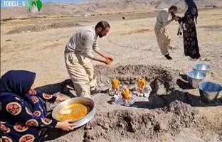 (ویدئو) کباب کردن دیدنی سه مرغ زیر سطل فلزی توسط خانواده روستایی بختیاری