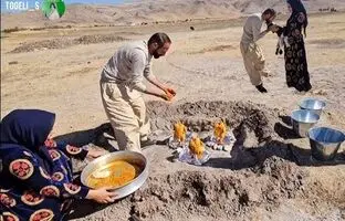 (ویدئو) کباب کردن دیدنی سه مرغ زیر سطل فلزی توسط خانواده روستایی بختیاری