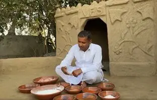(ویدئو) طبخ متفاوت ماهی بزرگ 7 کیلوگرمی توسط آشپز روستایی پاکستانی