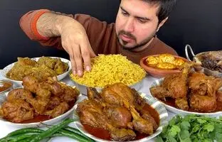 (ویدئو) خوردن تماشایی 3.1 کیلو پلو گوشت و مرغ توسط جوان مشهور پاکستانی