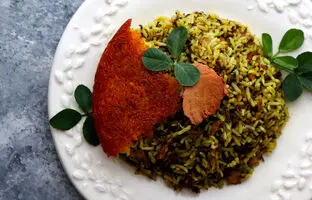 (ویدئو) طرز تهیه سبزی پلو ماهی جنوبی؛ متفاوت ترین و خوشمزه ترین سبزی پلو با ماهی عید