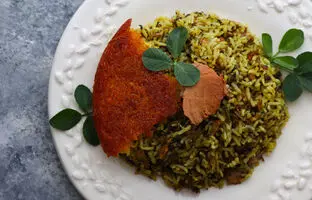 (ویدئو) طرز تهیه سبزی پلو ماهی جنوبی؛ متفاوت ترین و خوشمزه ترین سبزی پلو با ماهی عید