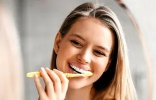 چگونه لکه های قهوه ای دندان را از بین ببریم؟