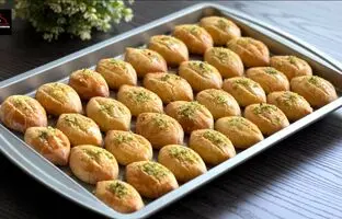 (ویدئو) ساده ترین روش تهیه شیرینی سمولینا مناسب ماه رمضان