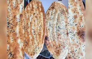 (ویدئو) فرآیند پخت نان بربری به شیوه افغان ها؛ تهیه نان در نانوایی کابلی