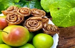 خوشمزه بپزید؛ طرز تهیه لواشک گوجه سبز خانگی
