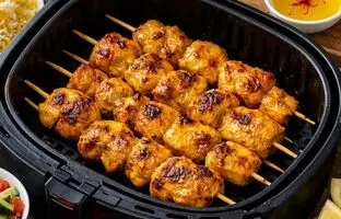 طرز تهیه جوجه کباب در هواپز؛ جوجه‌ای آبدار، زعفرانی و خوشمزه بدون دود و روغن زیاد