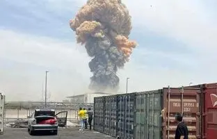 شاهکار عکاس ایرانی در دل دود بندر شهید رجایی