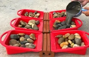 ببینید؛ نحوه ساخت یک گلدان زیبا با سیمان و سنگ ریزه به روش استاد چینی
