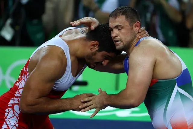 طاها آکگل: بهترین خاطره‌ام شکست کمیل قاسمی در فینال المپیک است