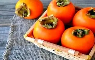 چرا خوردن خرمالو باعث انسداد روده می‌شود؟