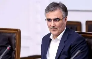 عکس عجیب از مصاحبه رییس‌ بانک‌ مرکزی با یک خبرنگار خانم + عکس