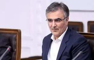 عکس عجیب از مصاحبه رییس‌ بانک‌ مرکزی با یک خبرنگار خانم + عکس