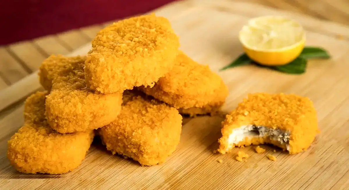 طرز تهیه ناگت خانگی با طعمی بهتر از فست‌فود‌ها + ویدئو