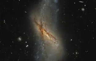 تصویر روز ناسا: کهکشان حلقه‌ای-قطبی NGC 660