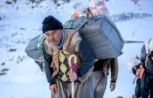 عکس قدیمی: کولبران قاجار حدود ١٩٠٠ 