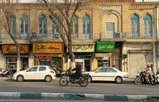 «خیابان فردوسی و درختان اش» در هوای برفی؛ سال 1295 + تصویر